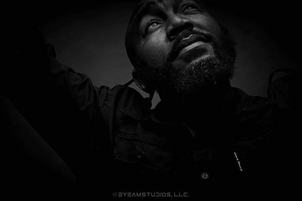 Dark black and white male portrait